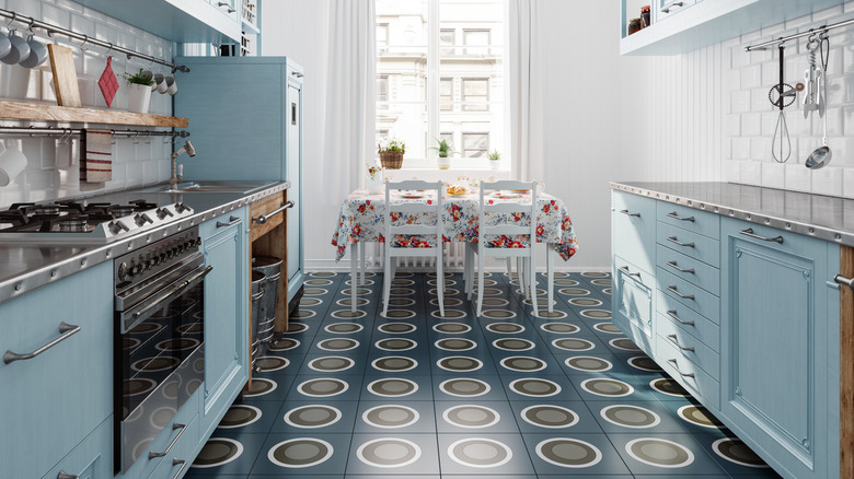 Blue kitchen with clean floor