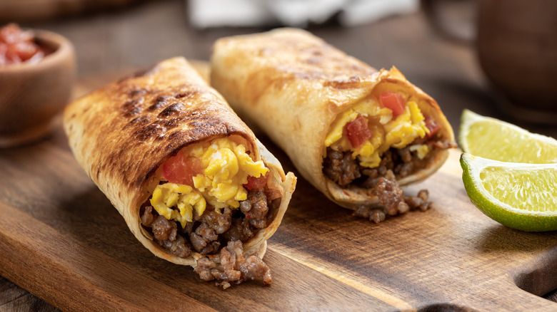 breakfast burrito on cutting board