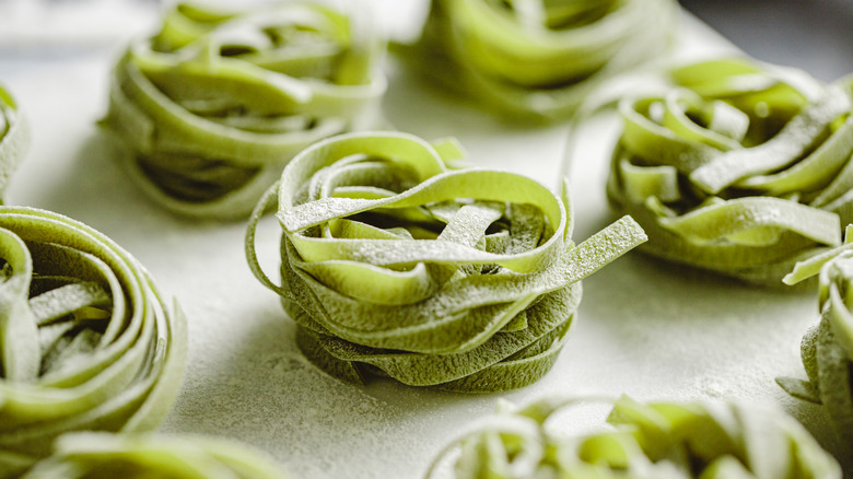 Piles of spinach pasta