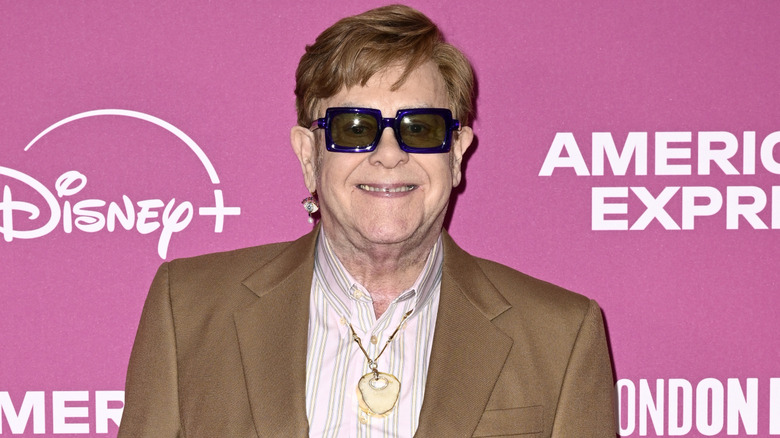 Elton John smiles at event