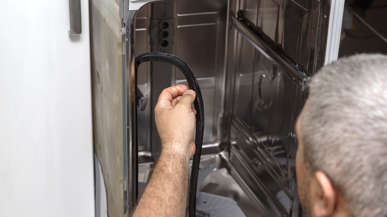 Dishwasher seal being removed