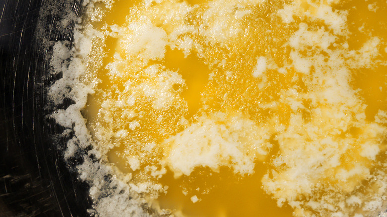 Milk solids separating from butter