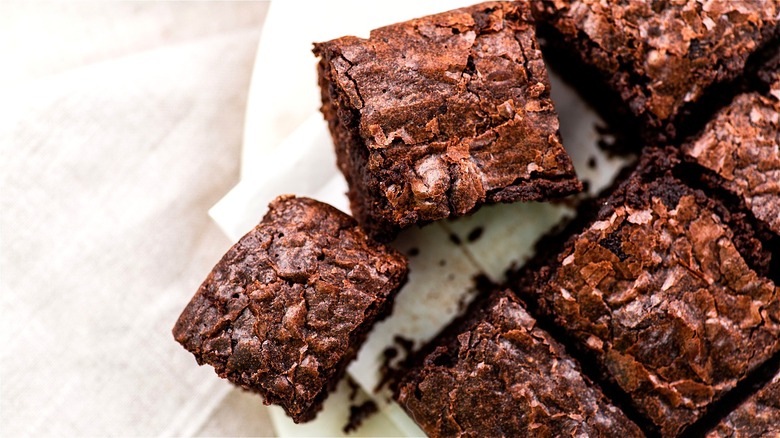 Cut brownies on white surface