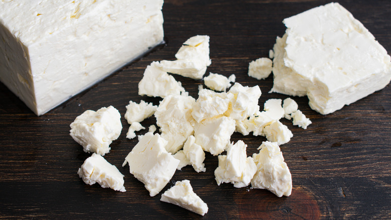 Crumbles from a block of feta cheese