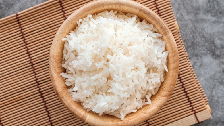 Fluffy rice in a wooden bowl