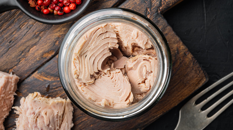 Canned tuna in oil on a table