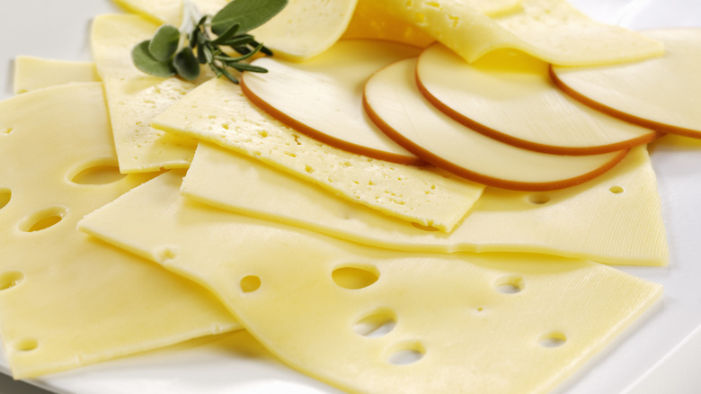 Slices of various types of cheese