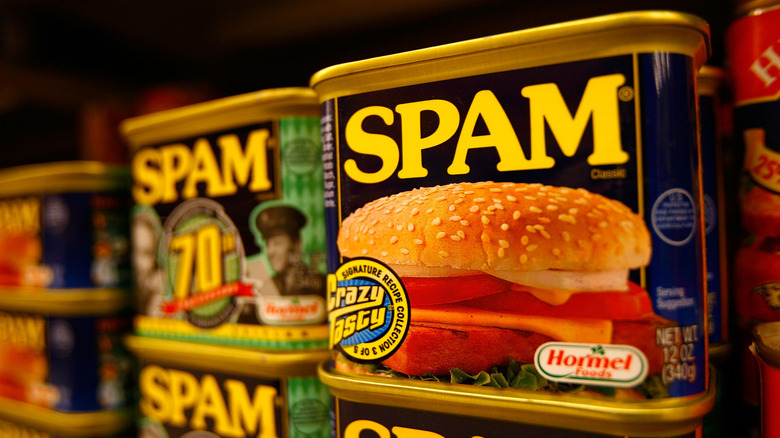 Cans of Spam on supermarket shelf