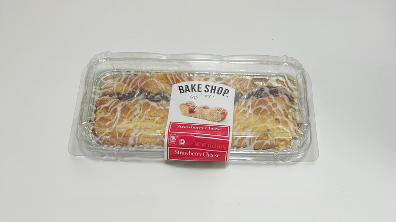 A container of Bake Shop Strawberry Cheese Danish on a white background