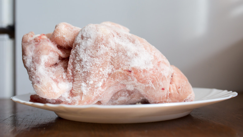 defrosting chicken on plate